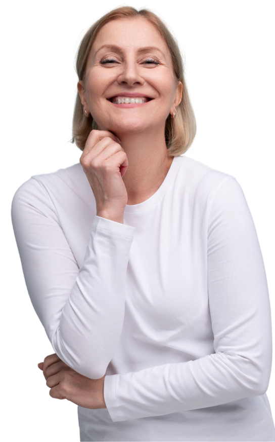 Happy and smiling older lady wearing a white shirt. Representing piece of mind from expert insurance coverage in Atmore, AL.